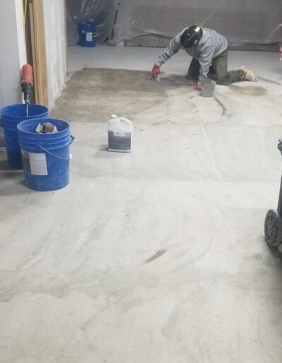 A man working on a floor