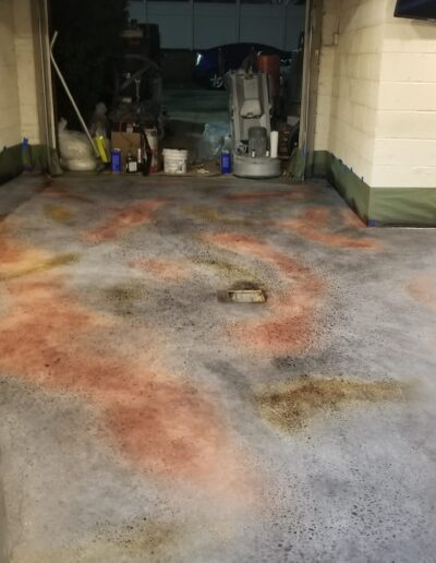 A garage filled with lots of dirty cement